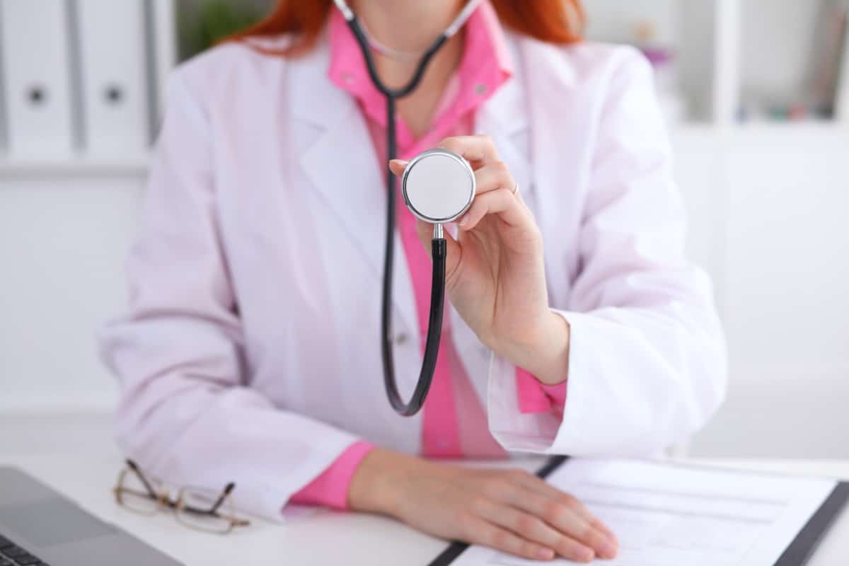 Doctor with a stethoscope in the hands