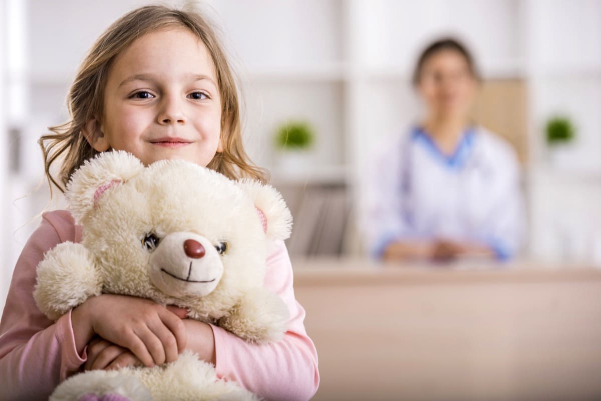 Little girl in a doctor